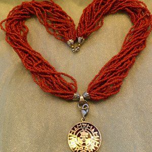 Multiple Strands Red Coral Necklace & Aztec Design Sterling Silver Pendant.